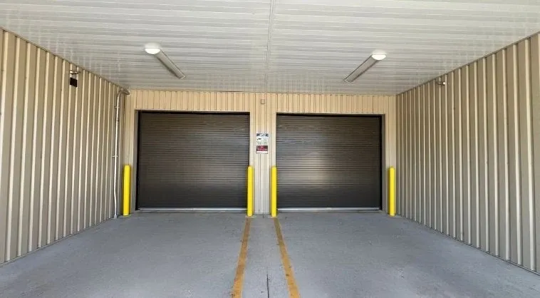 Covered loading bay at the facility with designated vehicle space
