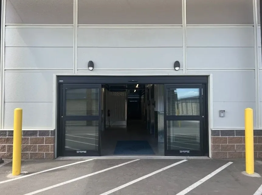 Covered loading area with vehicle access at the facility