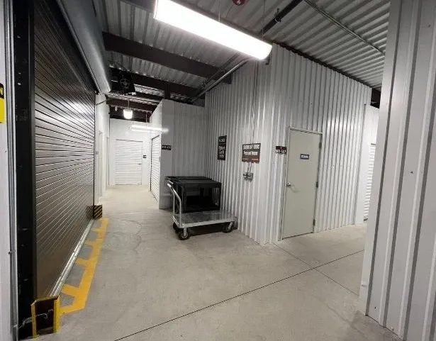 Loading area with dollies and carts to assist with moving items.